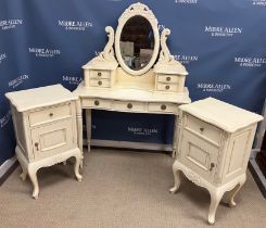 A cream painted dressing table in the Victorian style with mirrored and four drawer superstructure