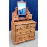 A Victorian pine dressing chest with mirrored four drawer superstructure over two short and two