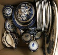 A collection of Booths Real Old Willow china to include a platter, dinner plates, lidded tureen,