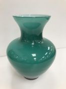 A Fabio Tosi for Murano green glass vase with white interior, inscribed to base,