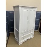 A child's Boori Royal Collection white lacquered two door wardrobe with two drawers below,
