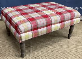 A modern Voyage Maison tartan upholstered stool on stained and turned tapering legs,