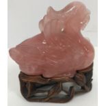 A Chinese rose quartz figure of a mandarin duck with lily in its beak 9.