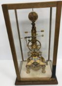 A modern brass skeleton clock with single fusee movement by James Green of Worsham,