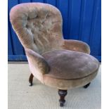 A Victorian walnut framed turquoise buttoned upholstered salon tub chair,