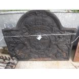 A cast iron fire back with Royal insignia and initialled CR 79 cm high x 100 cm wide