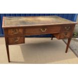 A late George III mahogany partner's desk or writing table,