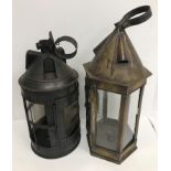 A 19th Century tin hanging candle lantern with glazed side panels, 42 cm high,