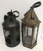 A 19th Century tin hanging candle lantern with glazed side panels, 42 cm high,