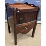 A late George III mahogany tray top night table with tambour front and pull-out compartment on