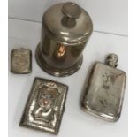 A collection of silver wares comprising a Victorian silver hip flask inscribed "A memento of the