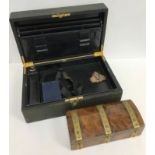 A late Victorian attaché case/leather writing box with gilt handle and inscribed “ACG” to top,