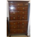 A walnut chest on chest in the early 18th Century manner,