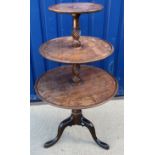 A late George III mahogany three tier dumb waiter,