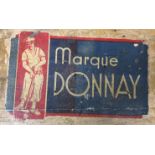 A Marque Donnay croquet set comprising three mallets, two sets of balls, six hoops,