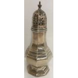 A George V silver sugar caster of octagonal lantern form,