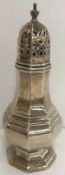 A George V silver sugar caster of octagonal lantern form,