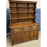 An Ercol elm dresser,