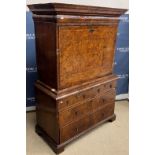 An early 18th Century burr walnut and feather banded secretaire,