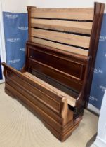 A mahogany double sleigh bed in the Louis-Philippe taste,