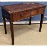 A George III mahogany side table, the plain top with reeded edge over two frieze drawers,