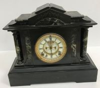 A Victorian black and green marble cased architectural mantel clock,