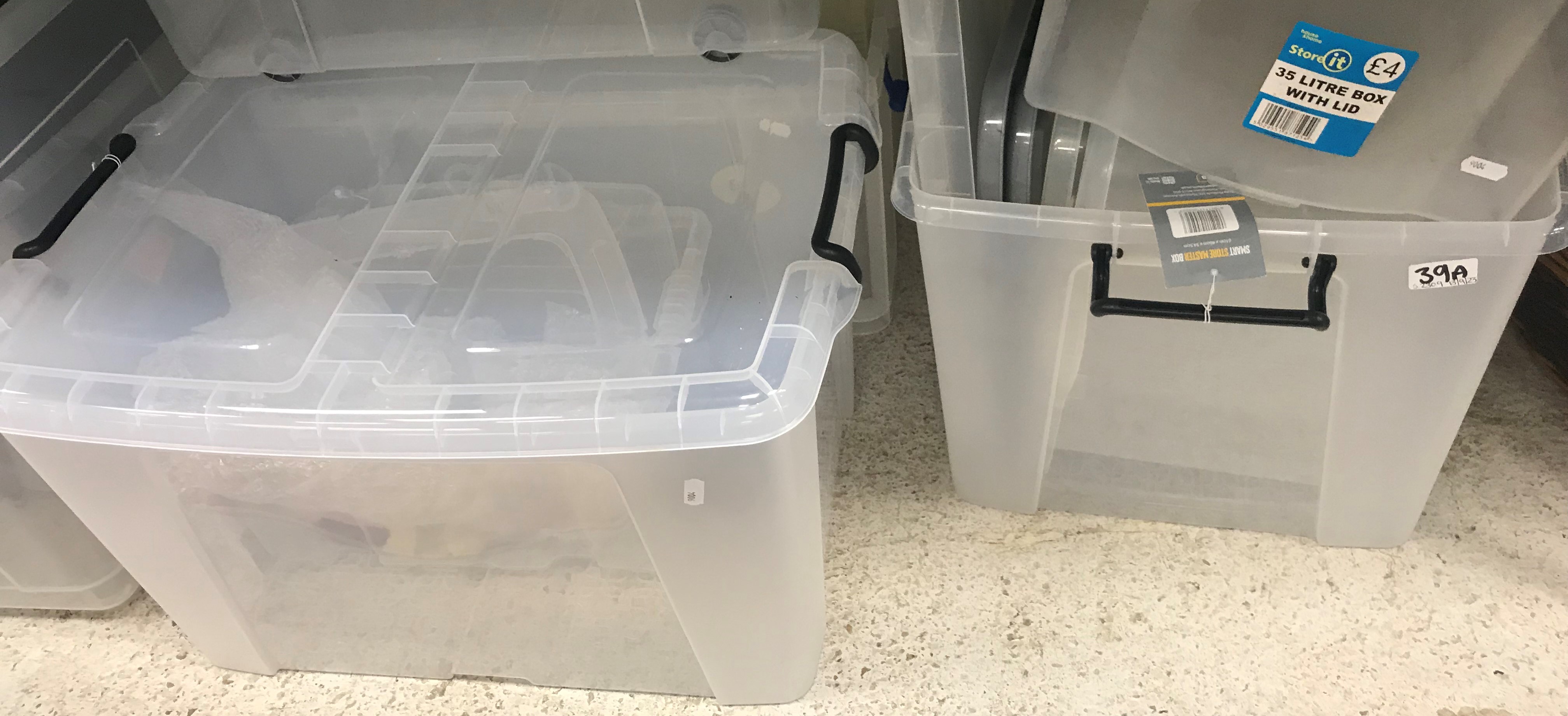 A large collection of plastic storage boxes