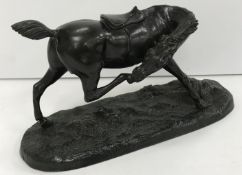A chocolate patinated bronze of a "Racehorse" in the style of Pierre Jules Mene,