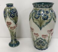 A Moorcroft Macintyre Burslem Pottery "Poppy" vase stamped with brown underglazed transfer printed