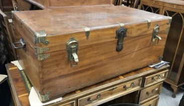 A late 19th / early 20th Century American teak brass bound trunk (locked - no key),