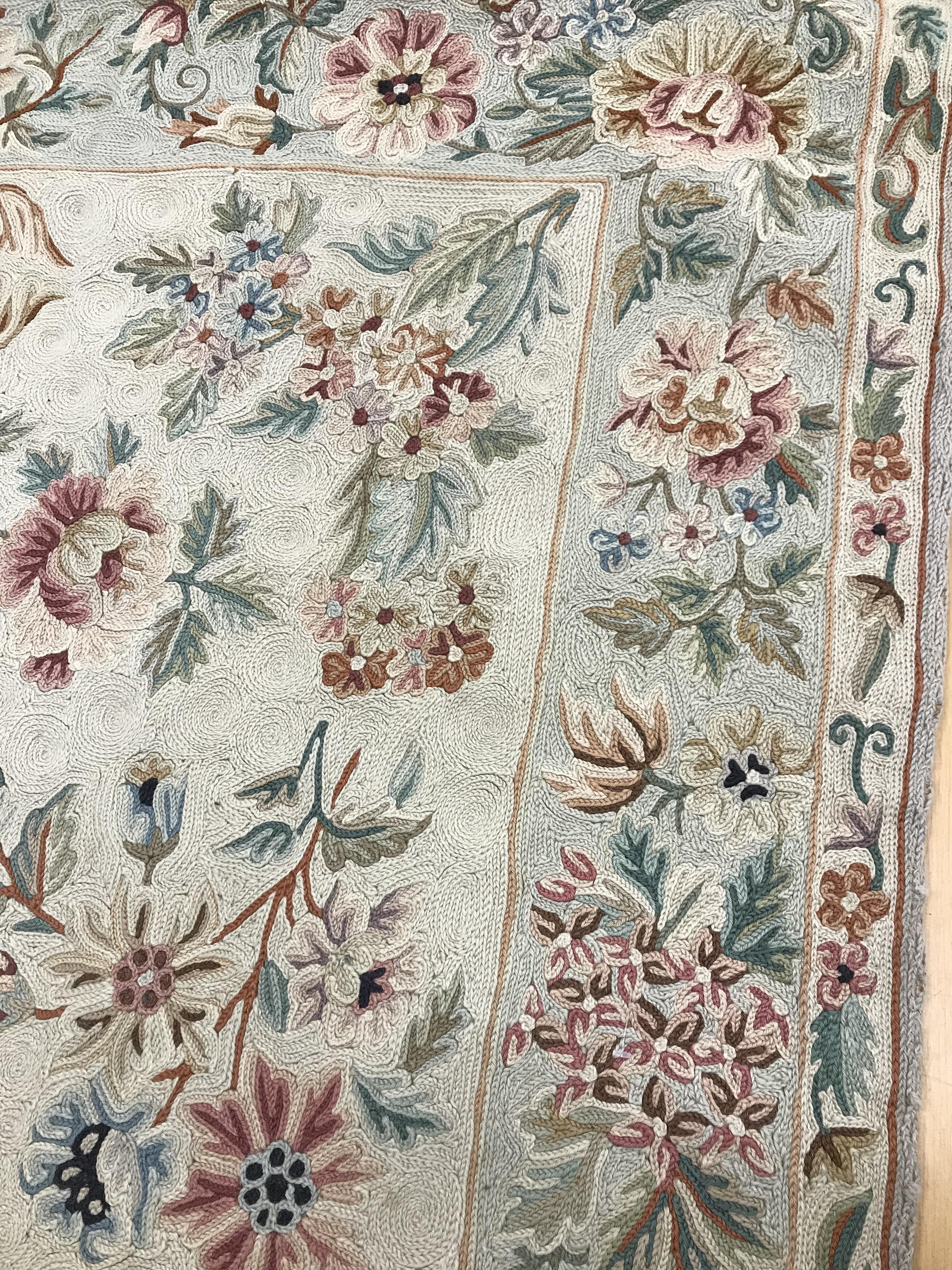 A crewel work panel with all-over foliate design and floral decorated border, - Image 10 of 12