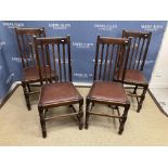 A set of four early 20th Century oak dinning chairs with bobbin turned front legs together with a