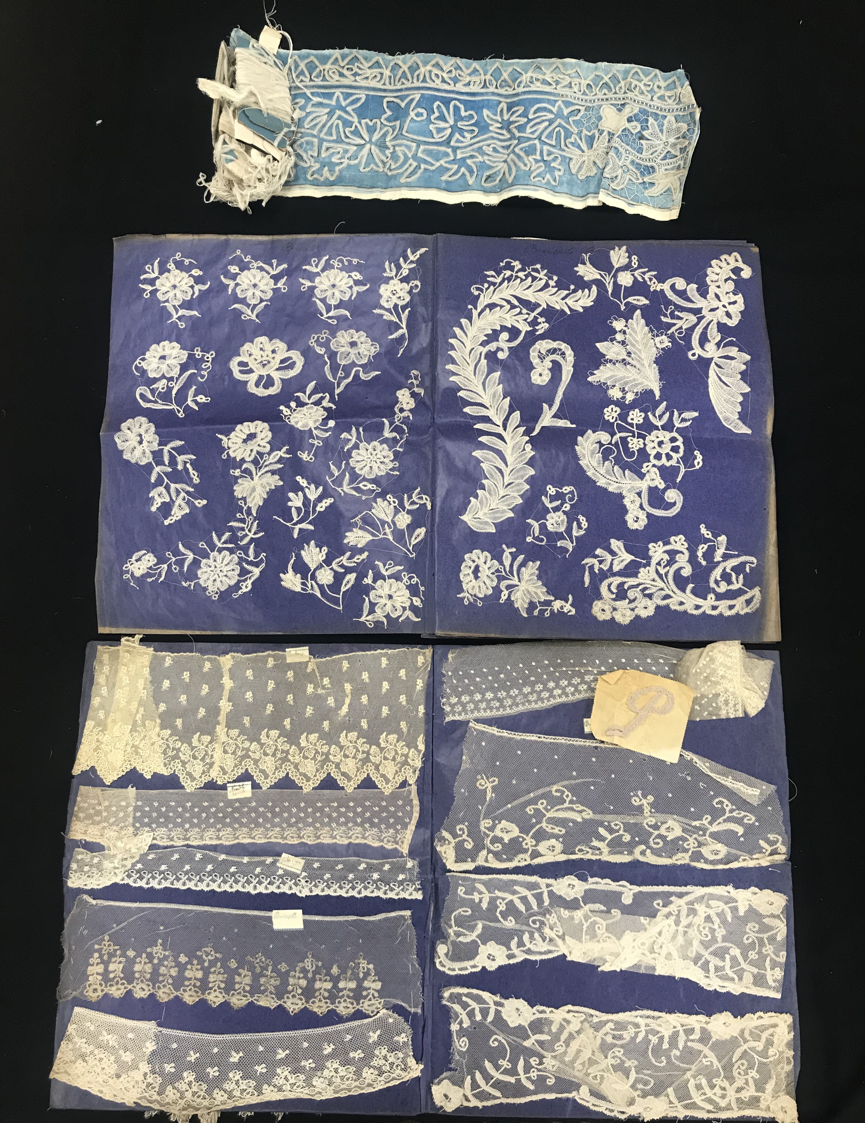 A collection of Brussels and other lace samples, mounted on waxed paper,