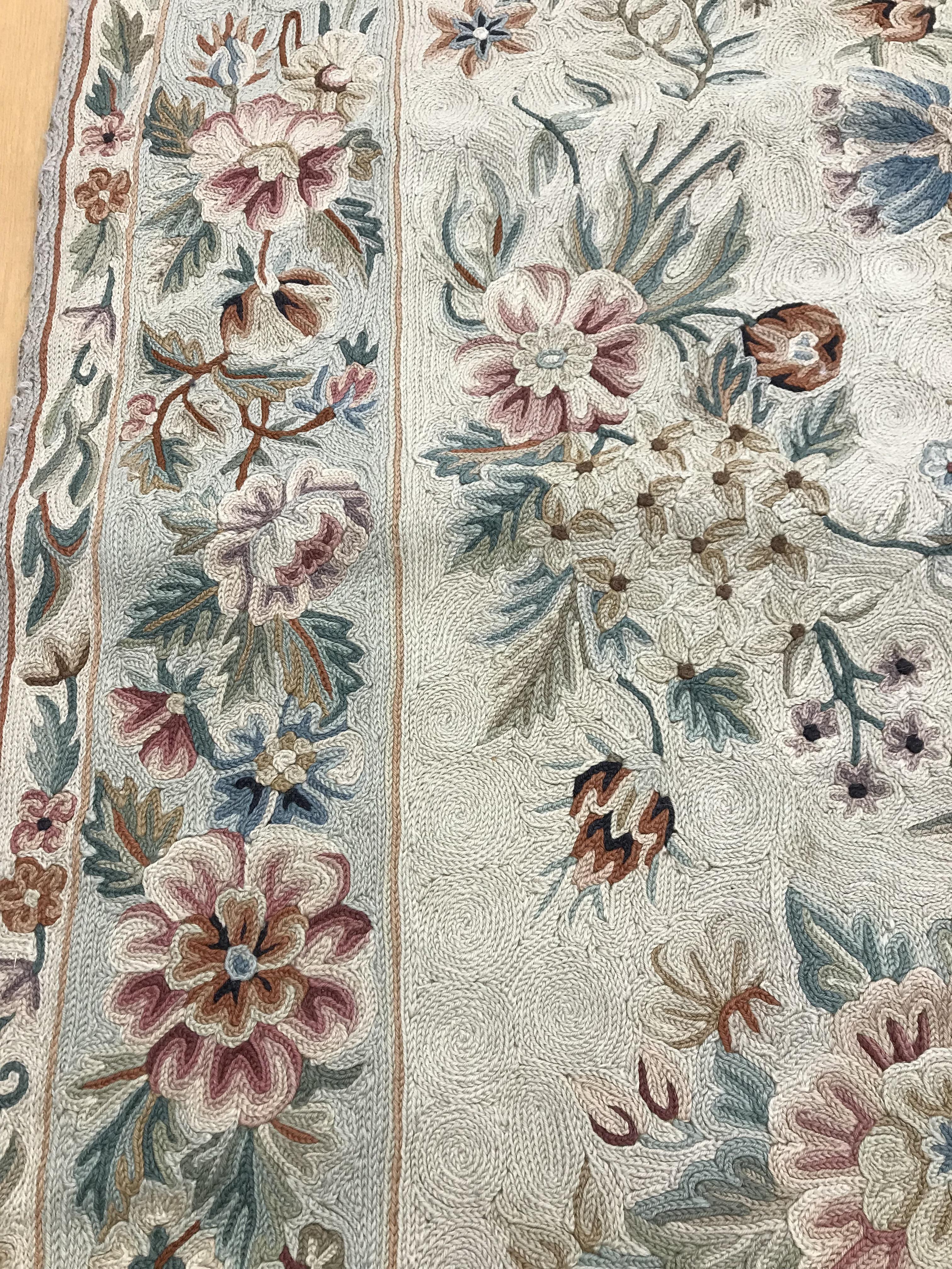 A crewel work panel with all-over foliate design and floral decorated border, - Image 7 of 12