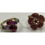 A 9 carat gold and pink sapphire set flower head design dress ring size K, 3.
