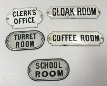 Five vintage enamel door signs including "Clerk's Office", "Cloakroom", "Turret Room",