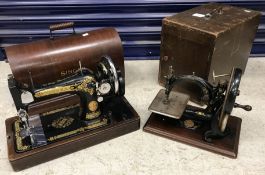 A vintage Wilcox & Gibbs sewing machine, housed in a mahogany case,