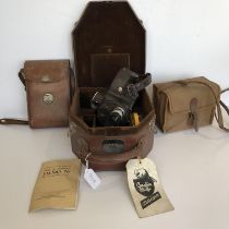A Bell & Howell Filmo camera 70-DA cine camera in fitted case with Sesamee combination lock