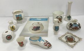 A collection of 65 WH Goss crested china items including Blandford-Forum, Weston-Super-Mare, Bath,