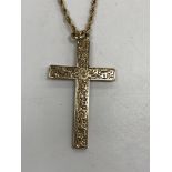 A 9 carat gold engraved cross pendant and rope twist chain, pendant 4.2 cm x 2.