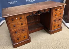 A Victorian mahogany kneehole desk,