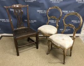 A pair of 19th Century carved giltwood and gesso kidney back salon chairs with upholstered seats on