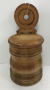 A 19th Century Scottish treenware wall mounted salt box with medallion shaped hanger and baluster