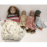 A collection of various early 20th Century dolls including a Simon & Halbig bisque-headed doll with