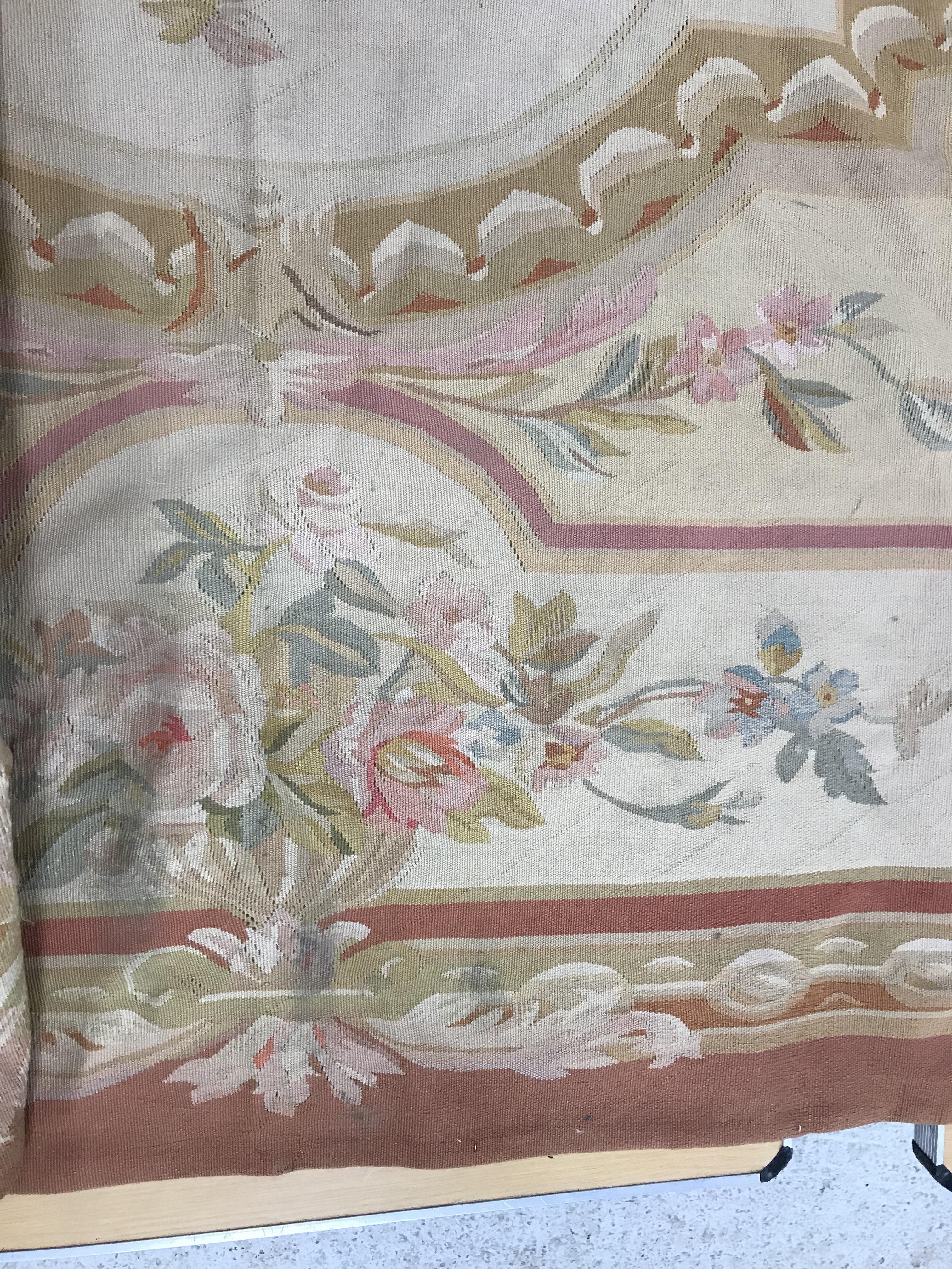 An Aubusson rug in terracotta and cream within foliate design, - Image 24 of 35
