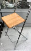 Two folding bar stools, folding chair, four various baskets and two handled tray, wine rack,