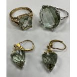 A 9 carat white gold and green quartz set dress ring size O, 5.