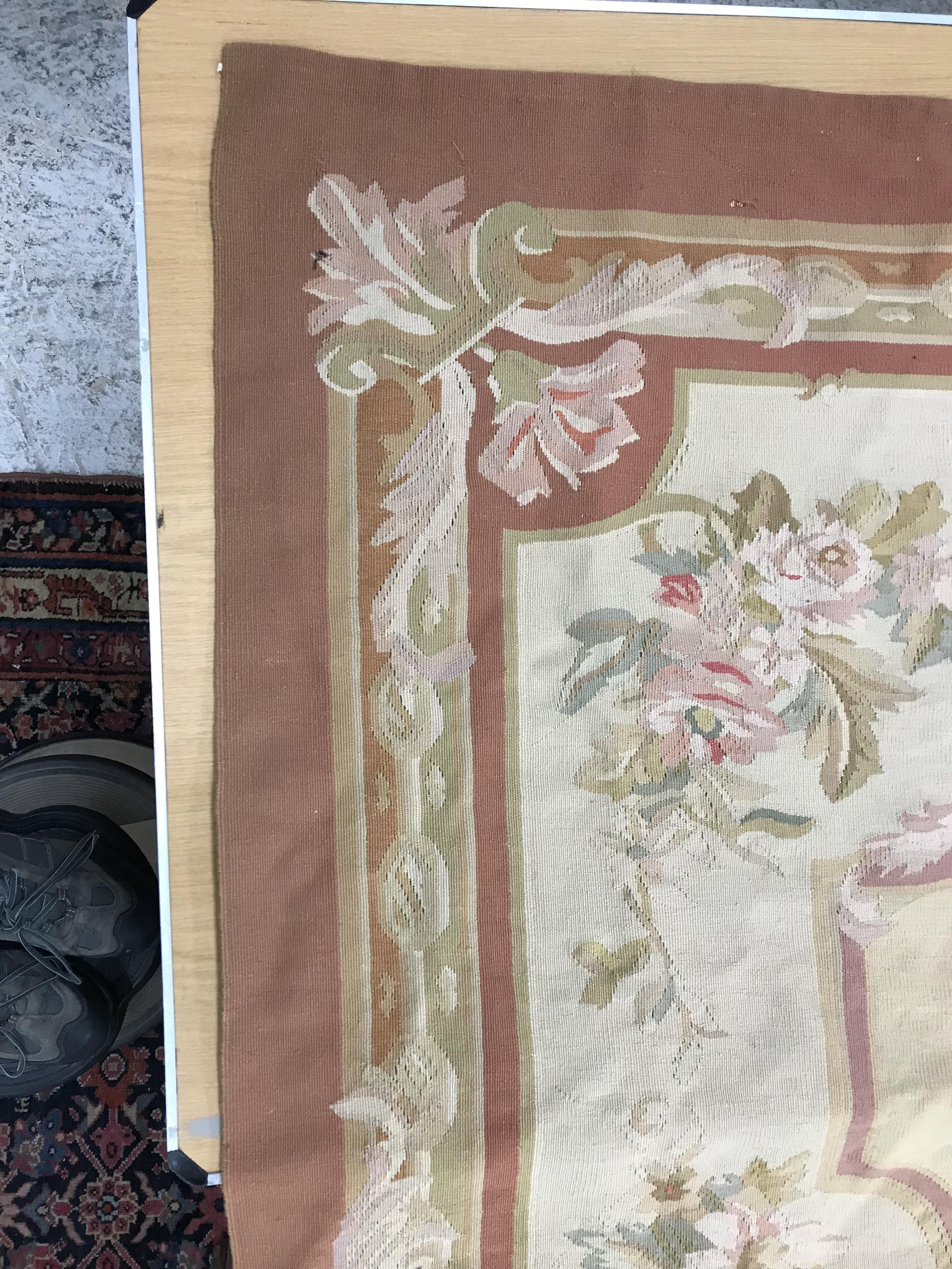 An Aubusson rug in terracotta and cream within foliate design, - Image 10 of 35