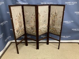 An Edwardian mahogany framed adjustable screen decorated with fabric covered panels in the Chinese