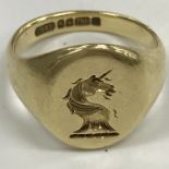 An 18 carat gold seal ring with unicorn bust motif 5.